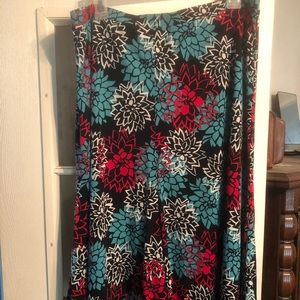 Multiple colors of red, white, turquoise & black